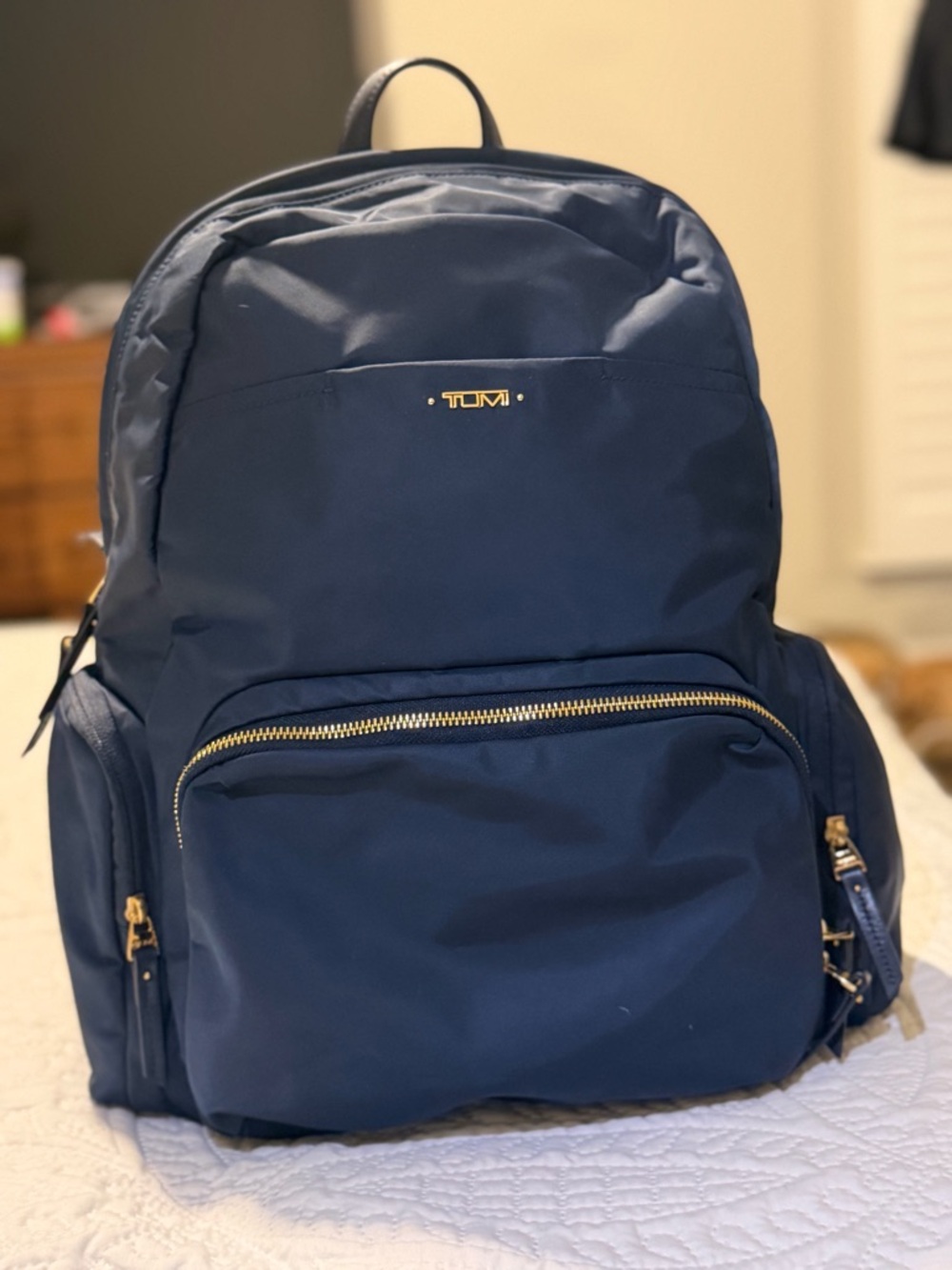 TUMI Navy Nylon Backpack with Gold Hardware